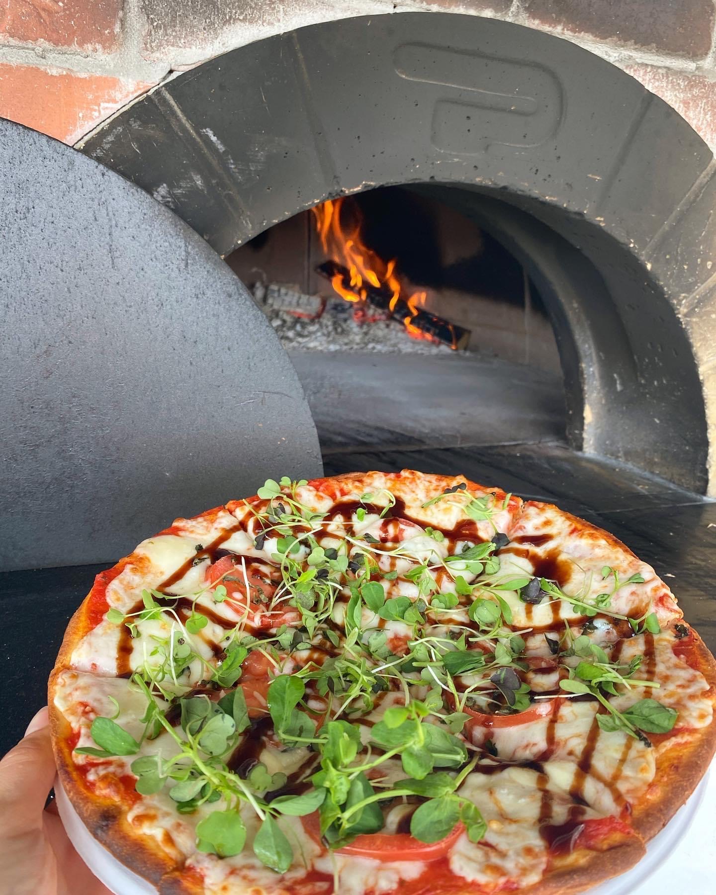 Wood-fired pizza.