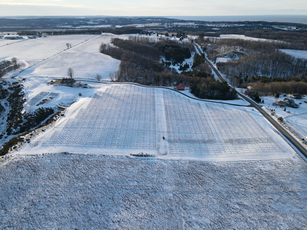 A drone photo of the vineyard and winery in the winter.